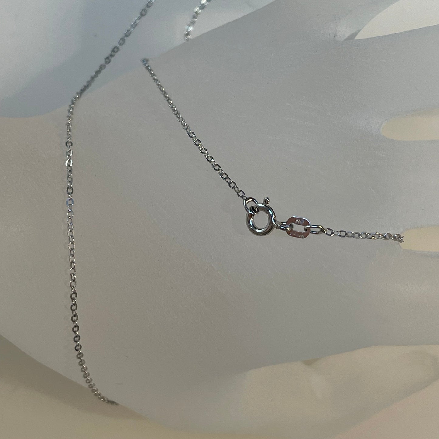 Closeup Spring Ring Clasp and 1.4mm diamond-cut flat cable chain