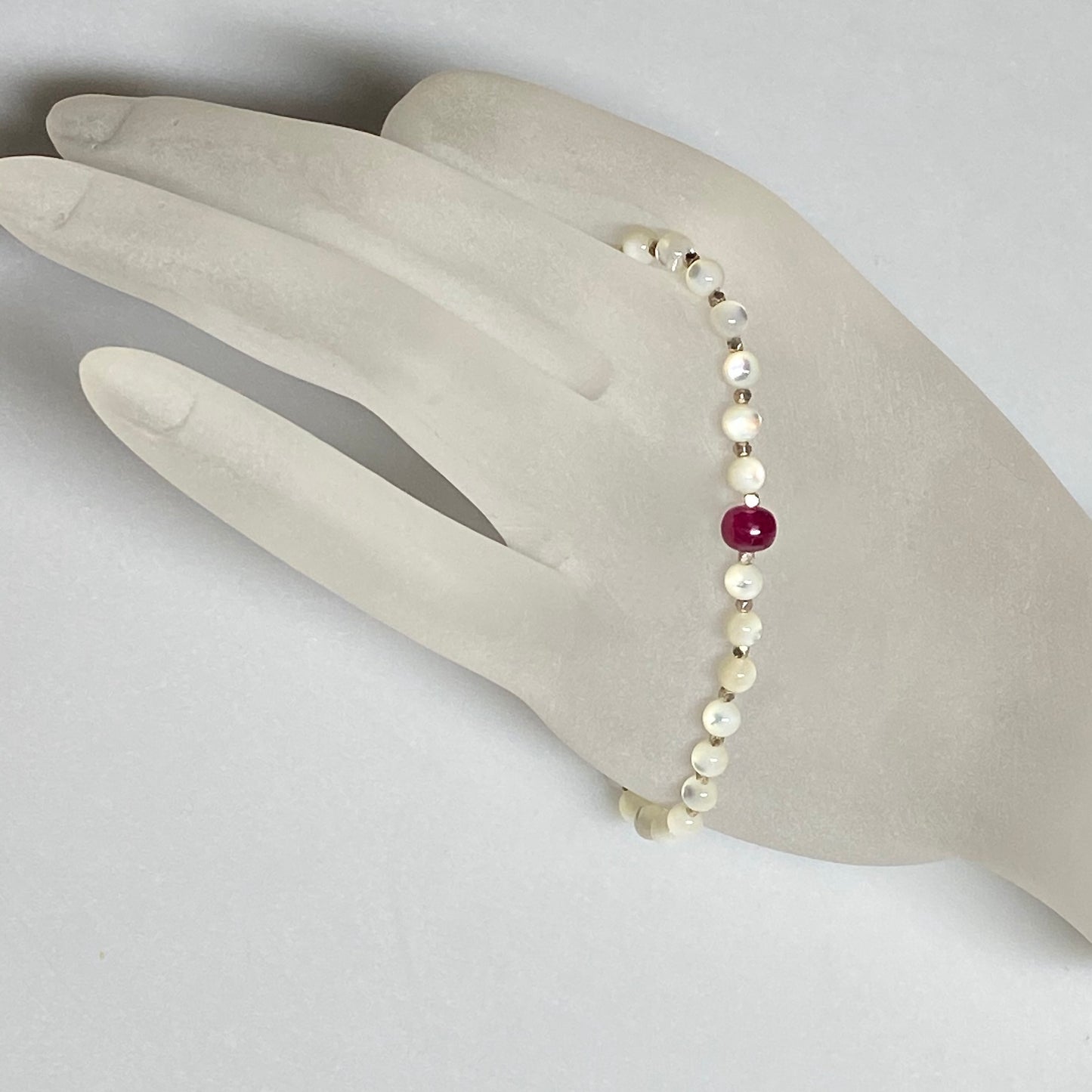 Arpaia gemstone stretch bracelet with natural ruby , mother or pearl, and 999 fine silver beads