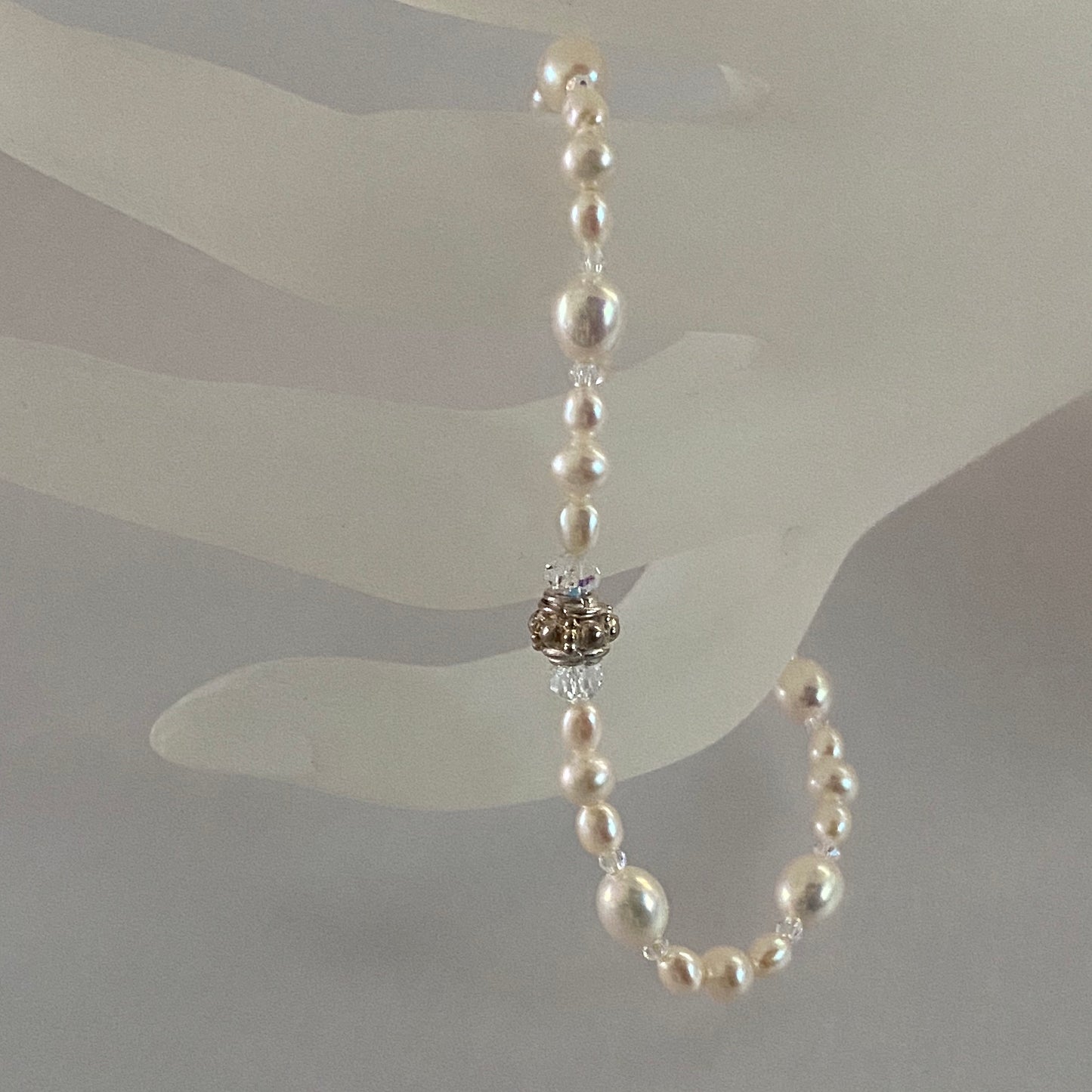 7-3/4" stretch bracelet with soft white freshwater cultured pearls and Swarovski crystal beads