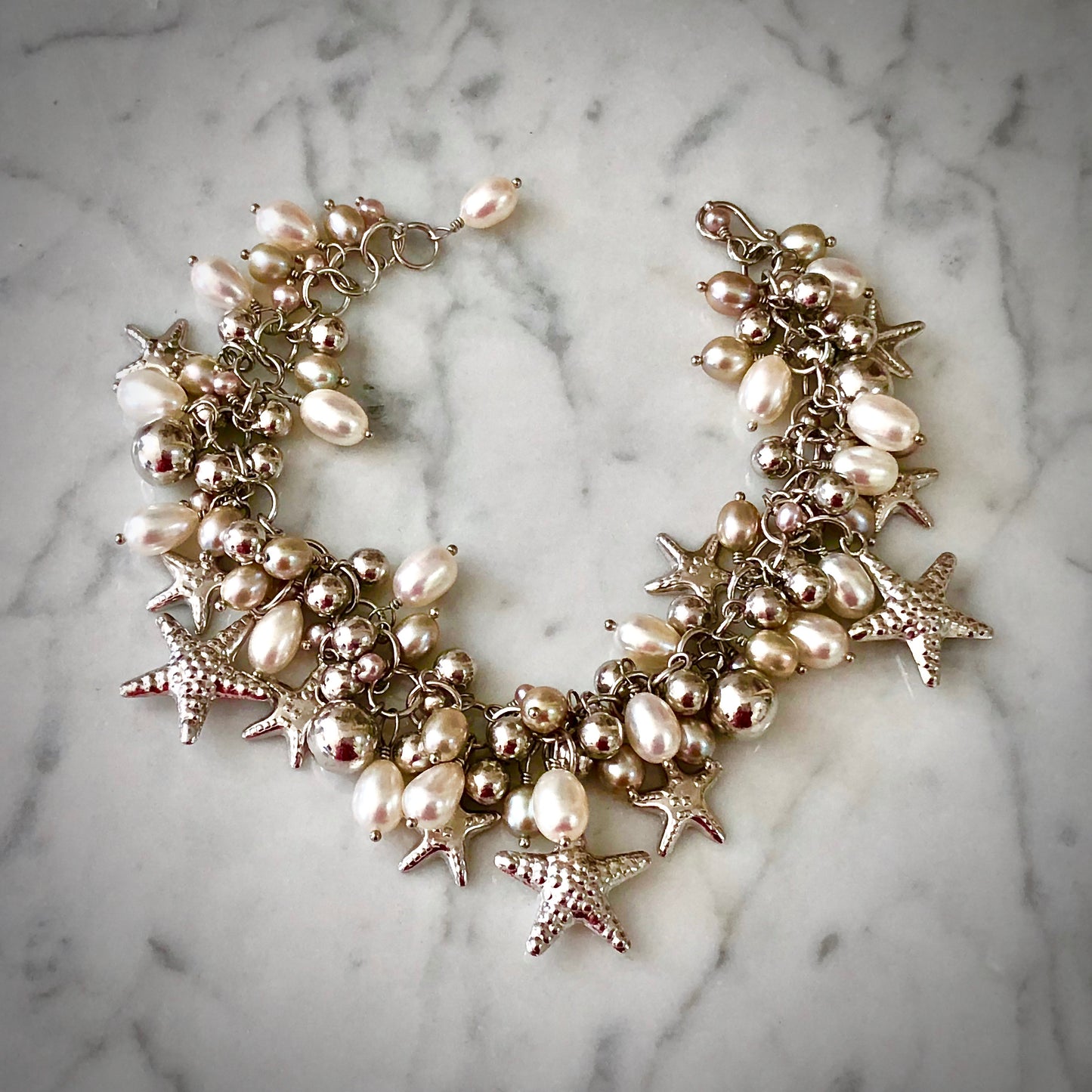 "White Beach" Cultured Pearl Starfish Bracelet by Arpaia in rhodium plated sterling silver