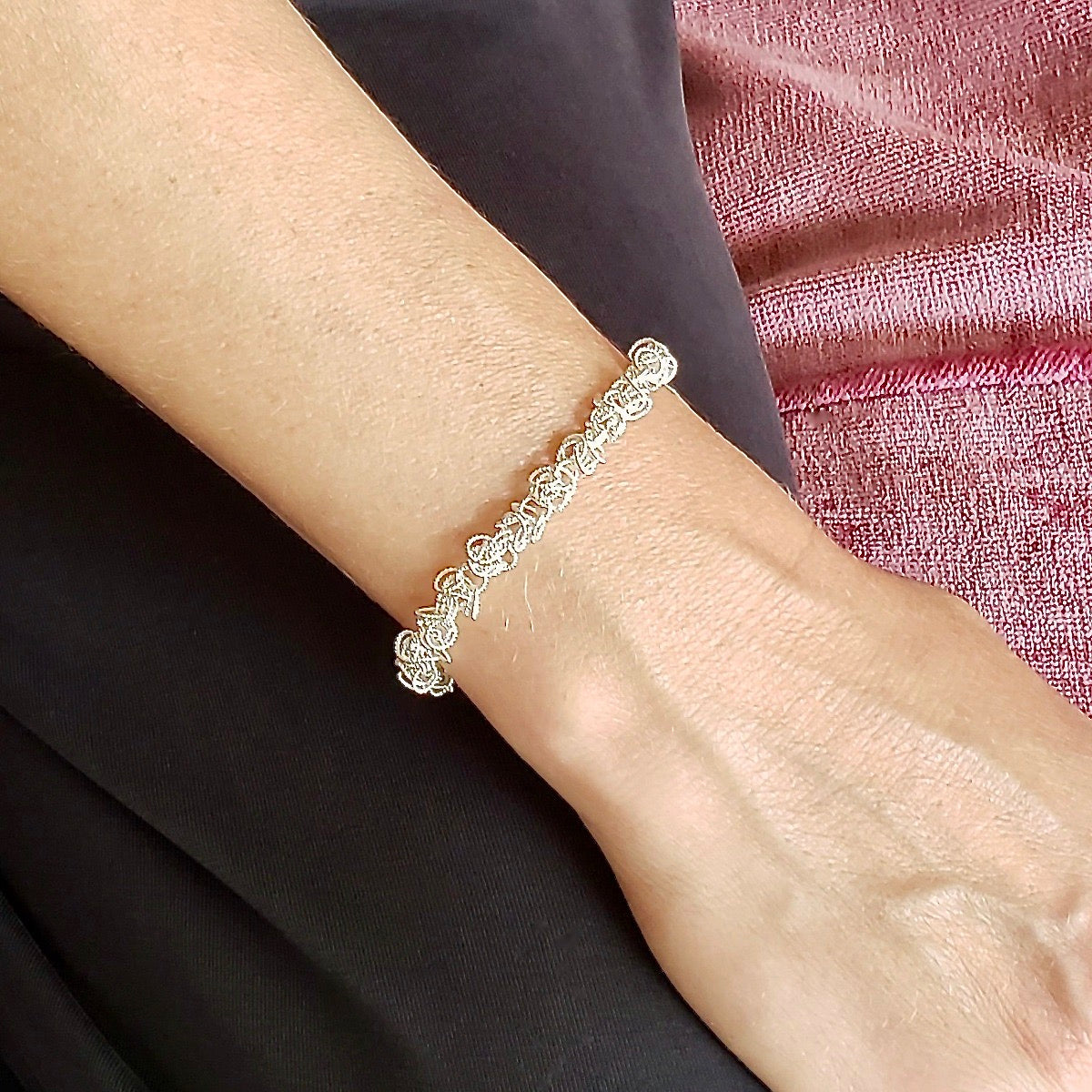 Arpaia Silver Frilly Bracelet on model - closeup inside natural light