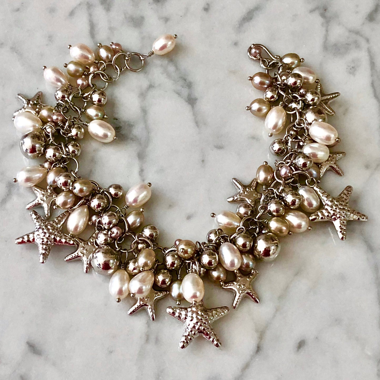 "White Beach" Cultured Pearl Starfish Bracelet by Arpaia in rhodium plated sterling silver