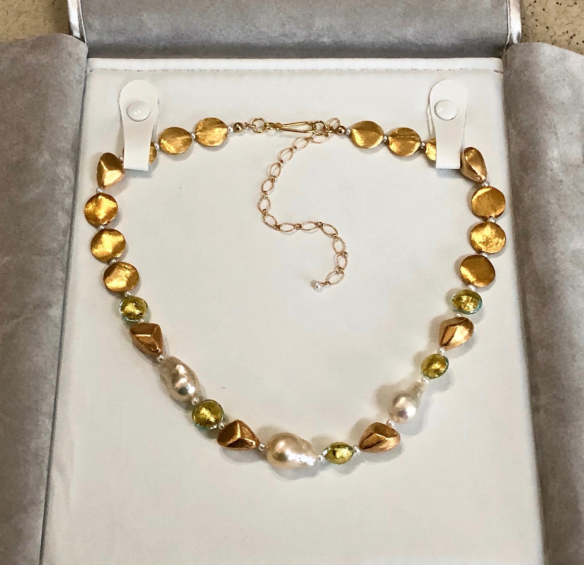 Italian jewelry folder with Arpaia Jewelry necklace