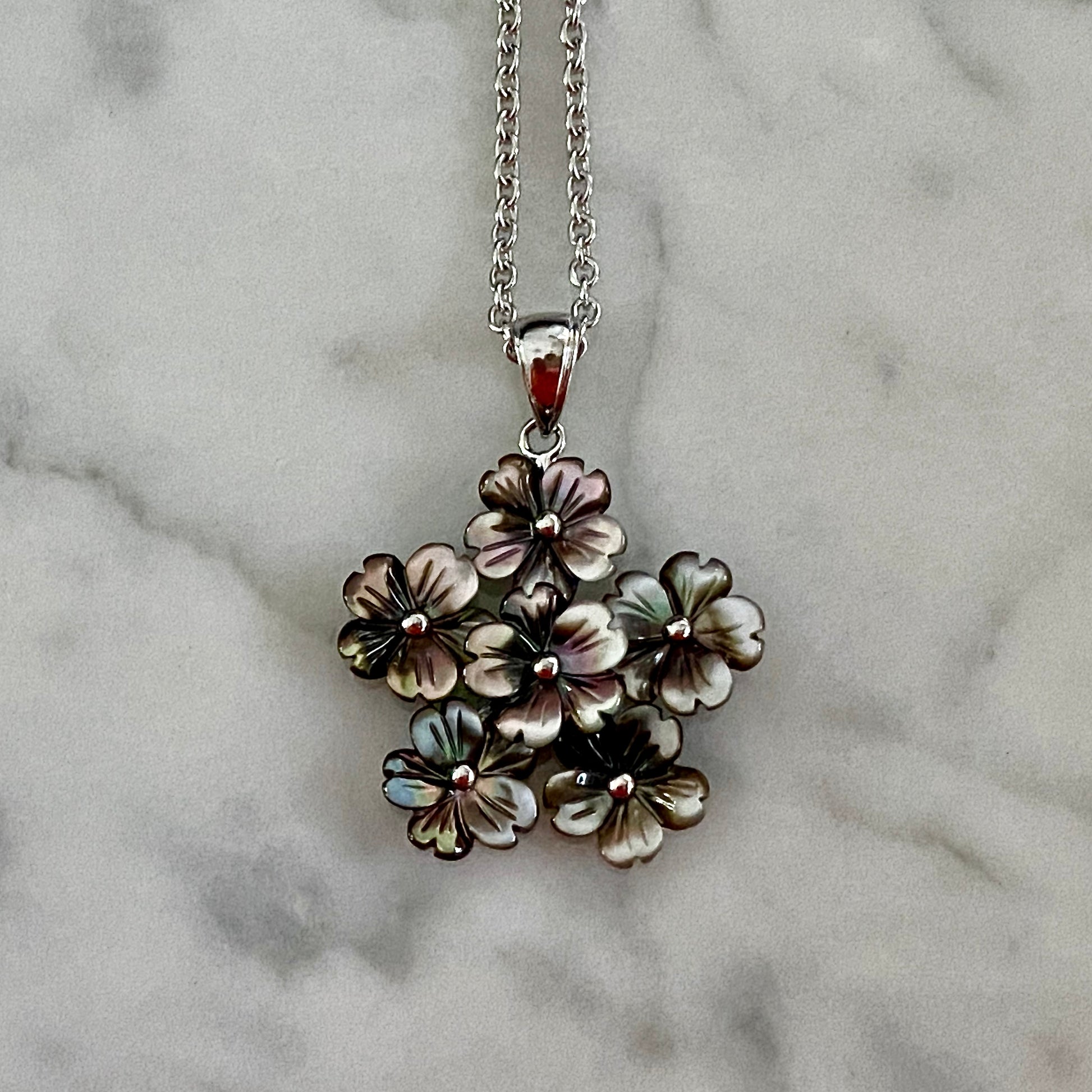 black mother of pearl flower bouquet pendant on adjustable chain / Arpaia Jewelry