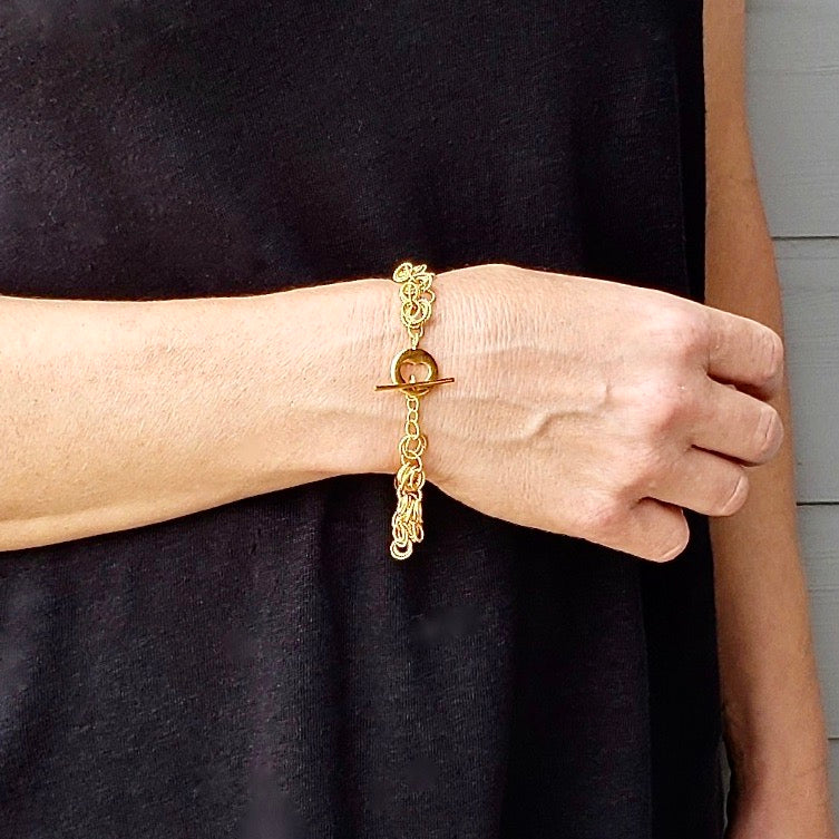 Vermeil Frilly  Bracelet on model with clasp facing up