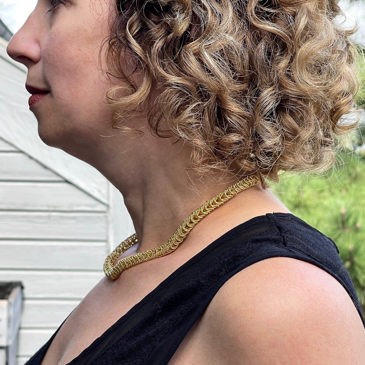 Side View Champagne Vermeil 8mm Bellezza Necklace on model