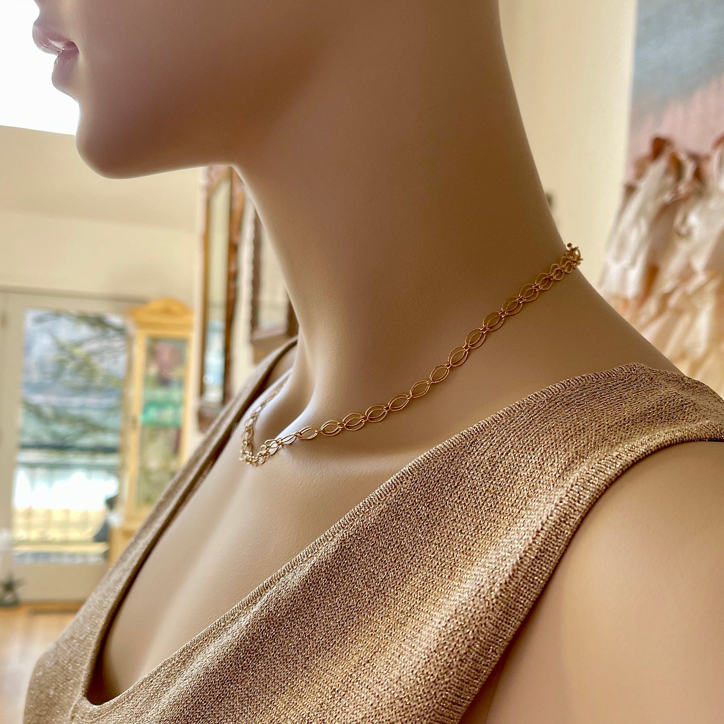 Side View of 14K GF Double Strand Marquise Link Chain Necklace shown full length on mannequin / Arpaia