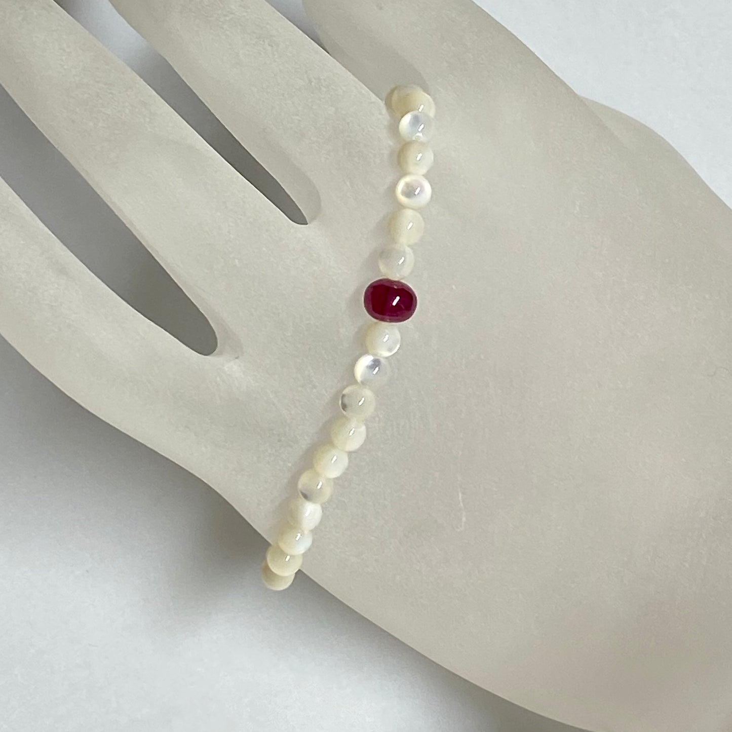 Arpaia 6.5" gemstone stretch bracelet with natural ruby & white mother of pearl