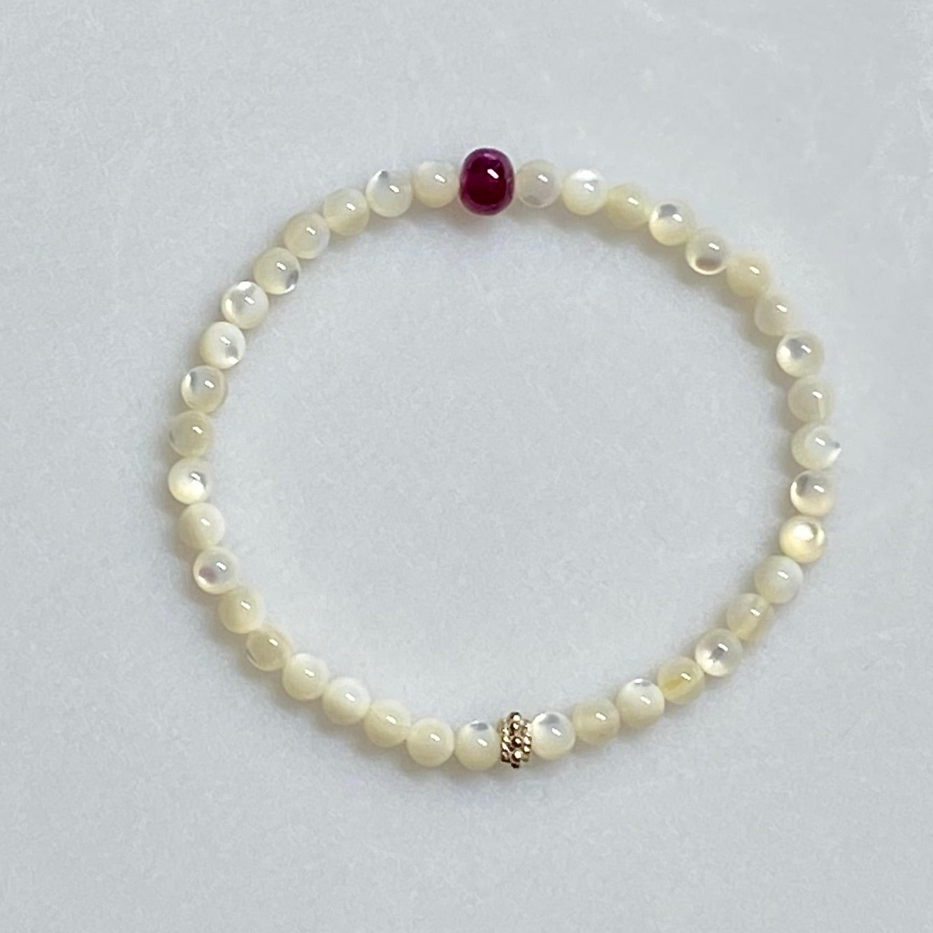Arpaia 6.5" gemstone stretch bracelet with natural ruby & white mother of pearl