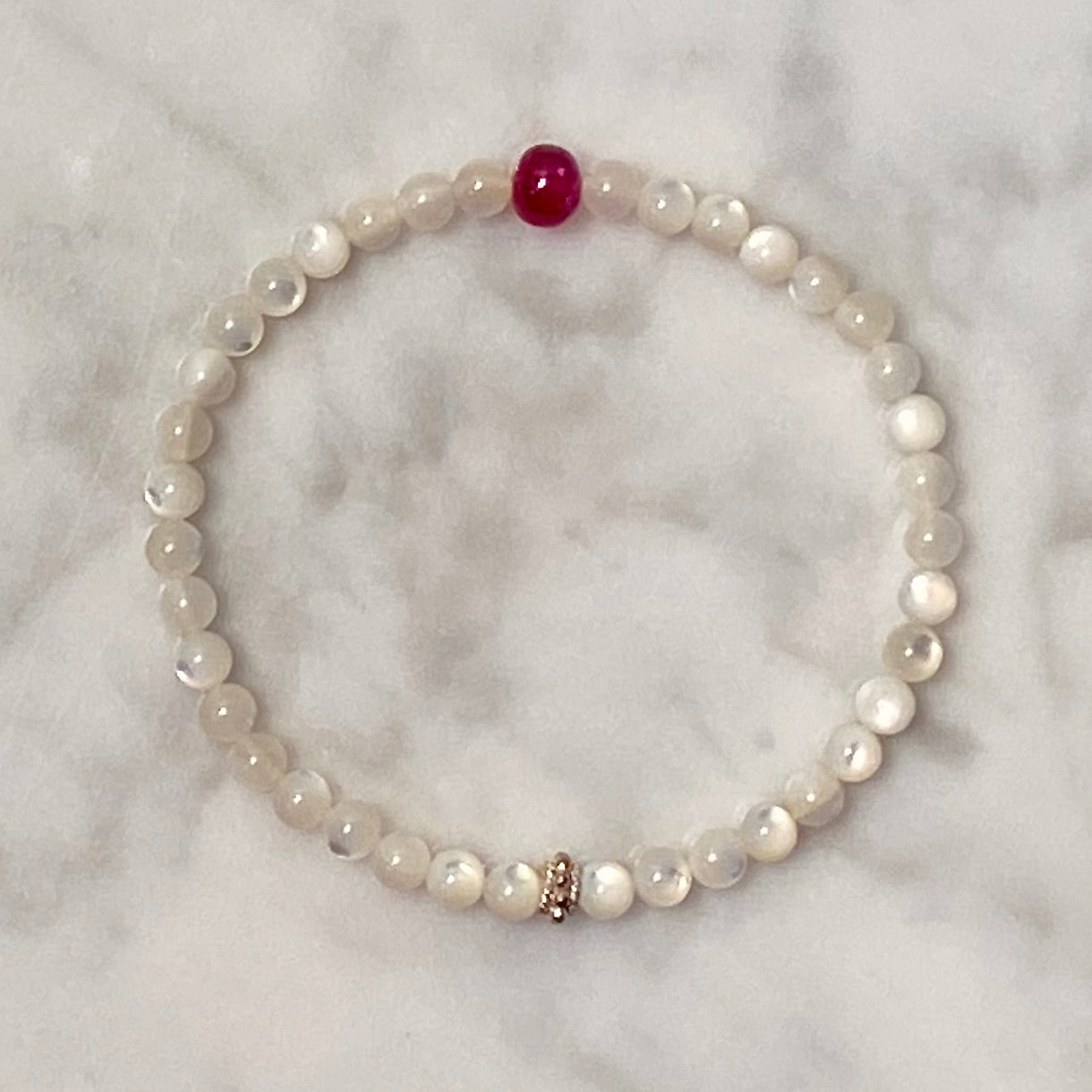 Arpaia 6.5" gemstone stretch bracelet with natural ruby & white mother of pearl