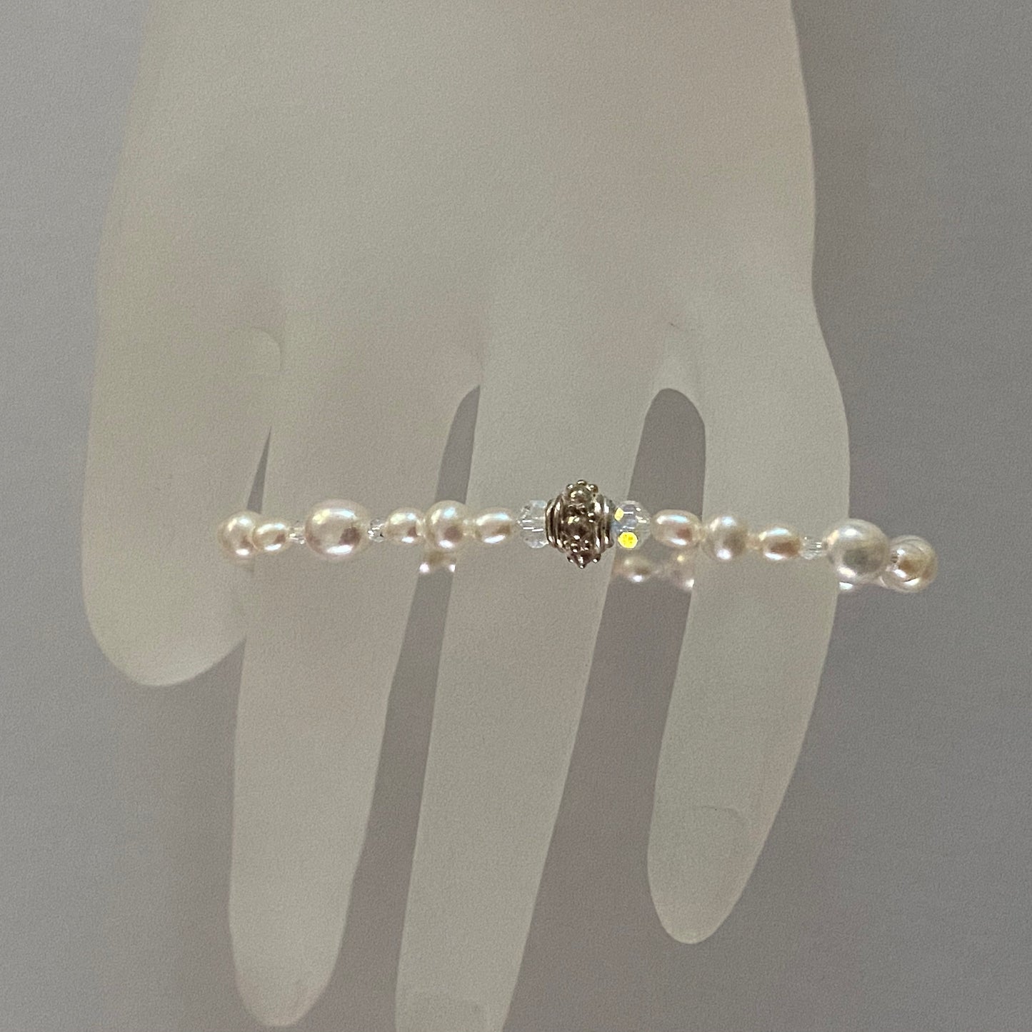 7-3/4" stretch bracelet with soft white freshwater cultured pearls and Swarovski crystal beads