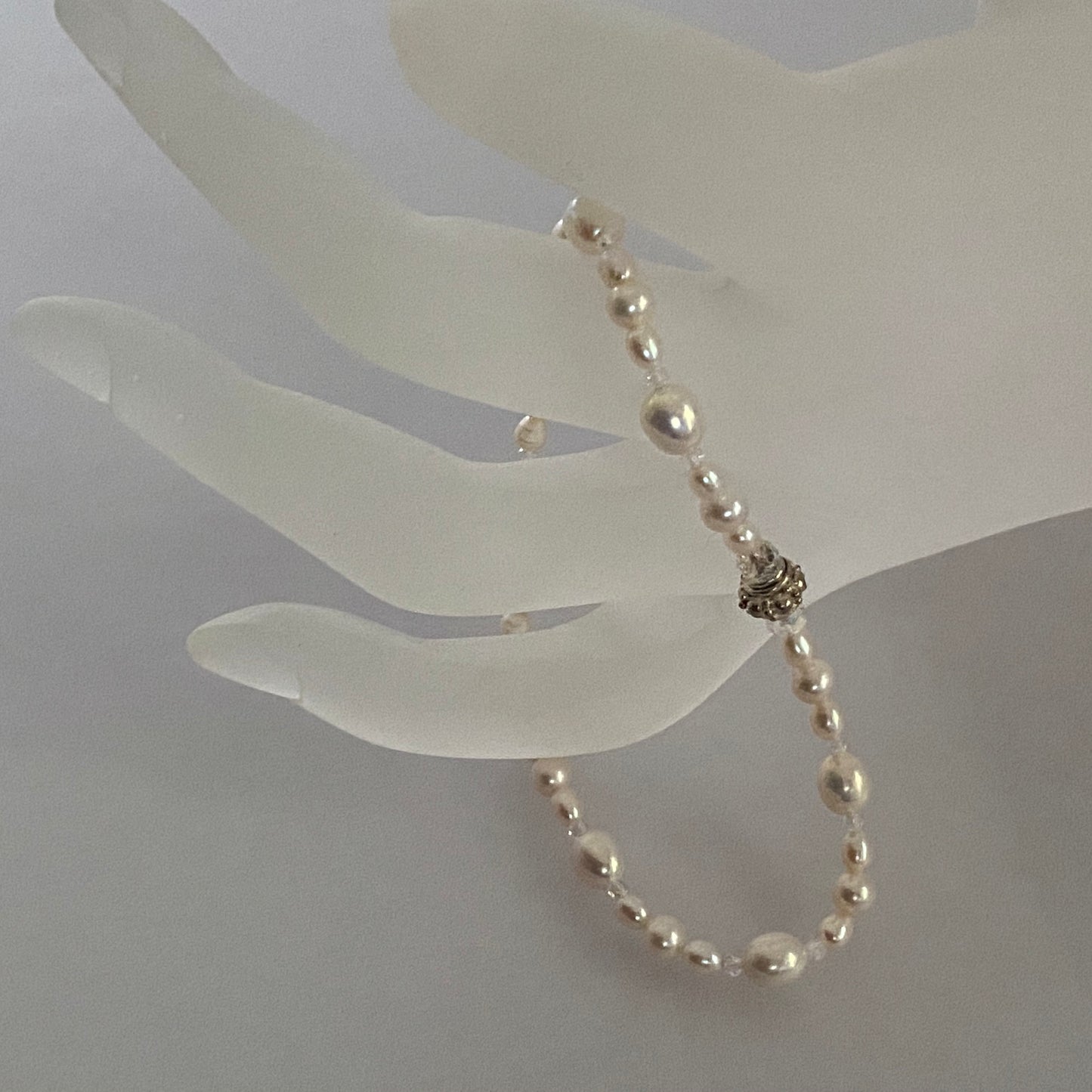 7-3/4" stretch bracelet with soft white freshwater cultured pearls and Swarovski crystal beads