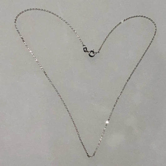 16, 18, and 20-inch slender Italian 925 sterling silver Diamond-Cut cable chain with spring ring clasp. Rhodium Plated.