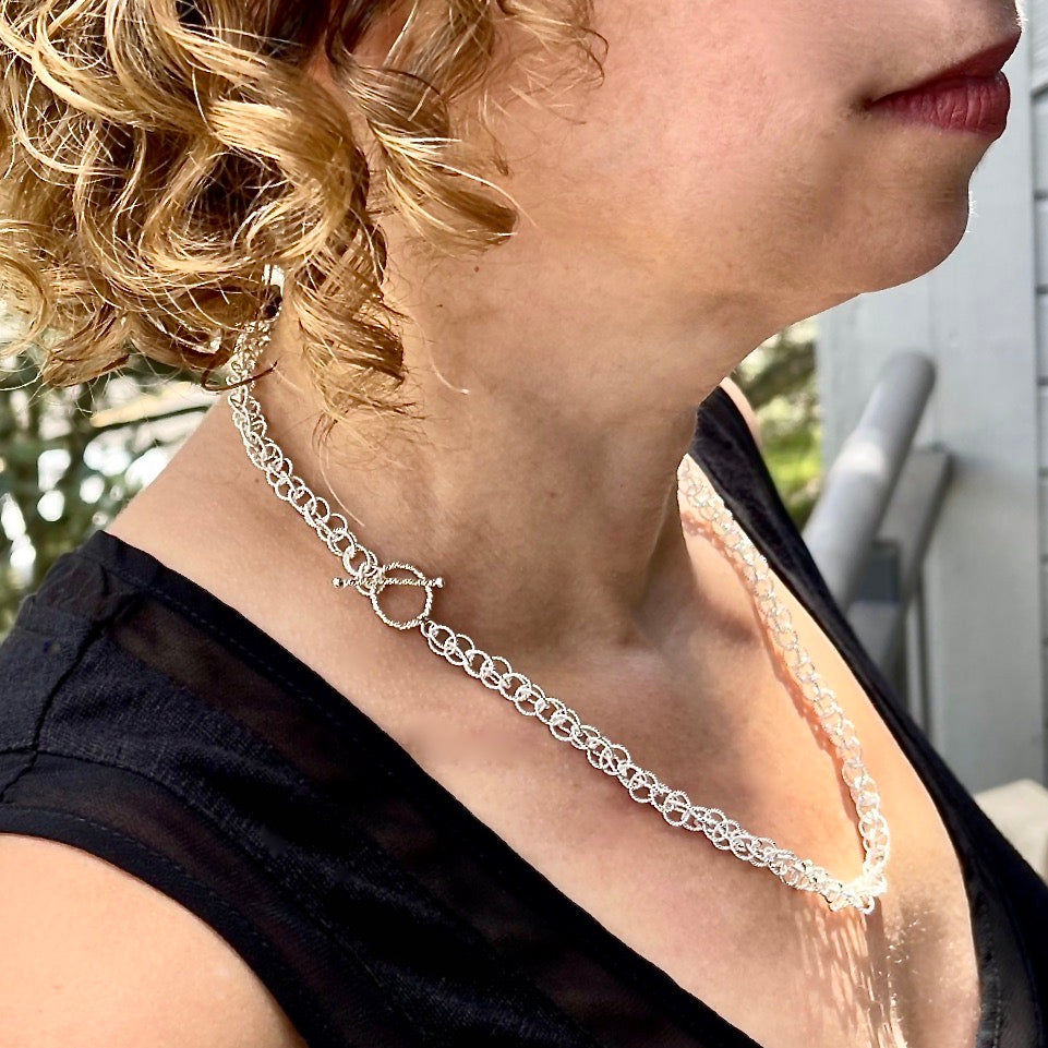 Necklace on model with clasp worn to side / Arpaia Lang