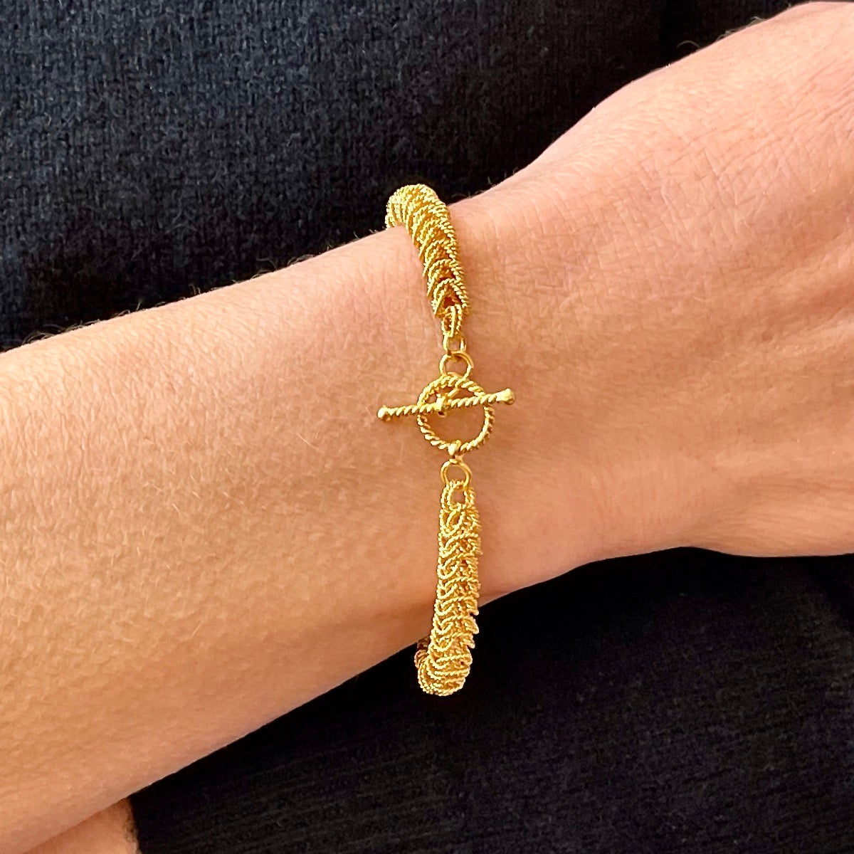 6.5mm 24K Gold Vermeil Bellezza Bracelet on Model with clasp facing up / Arpaia Lang